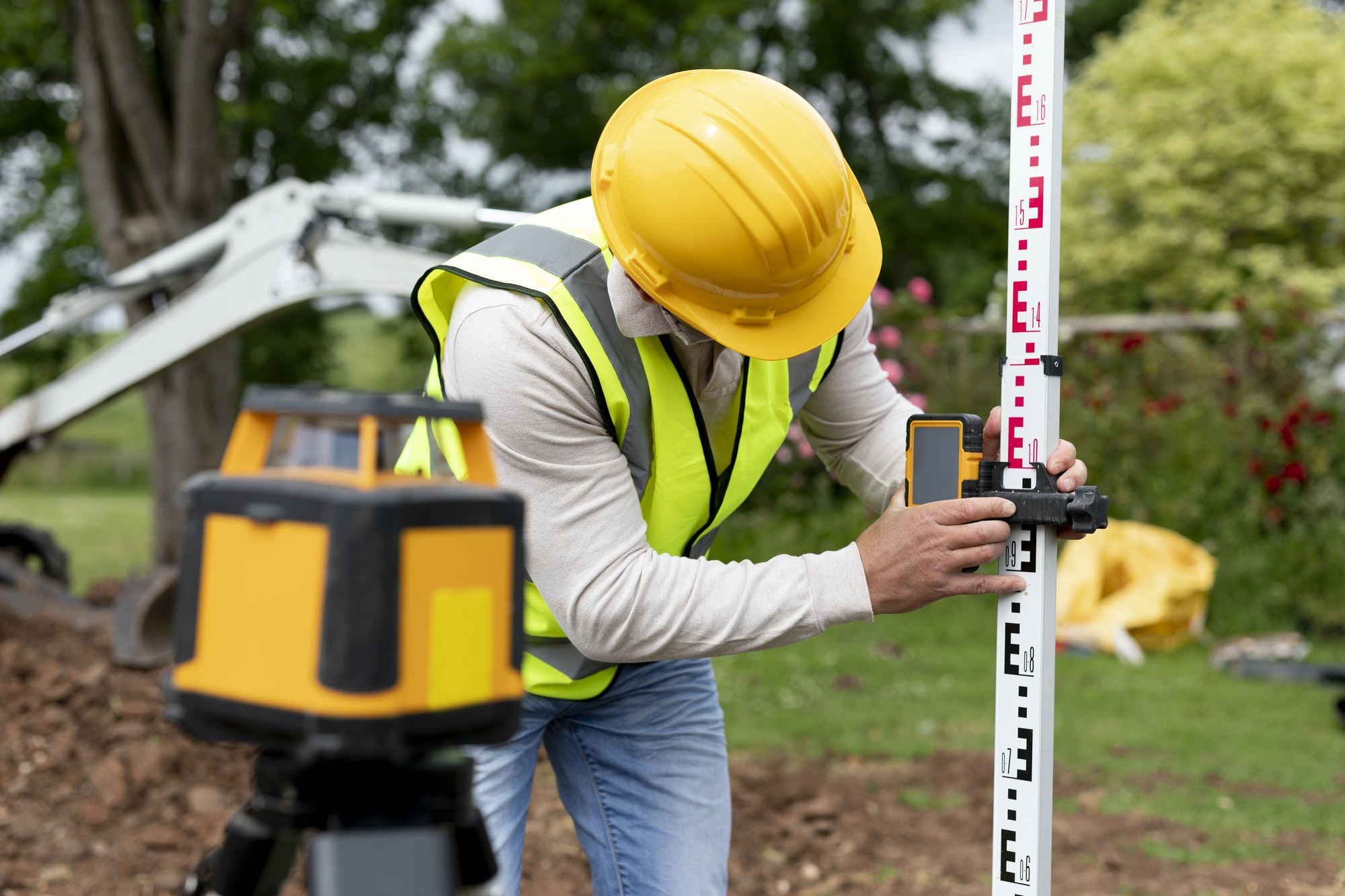 contractor-land-surveying-the-backyard.jpg contractor-land-surveying-the-backyard.jpg